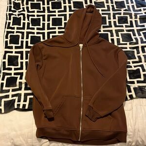 Unisex large brown zip up hoodie by orange kiss essentials. Gently worn like new